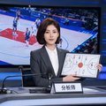 一位短发干练的女性篮球分析师